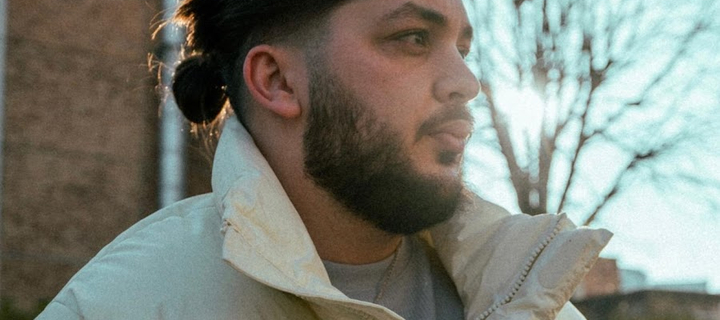 This is the Avatar Image for the JL Tomy AI Voice and Text to Speech Generator